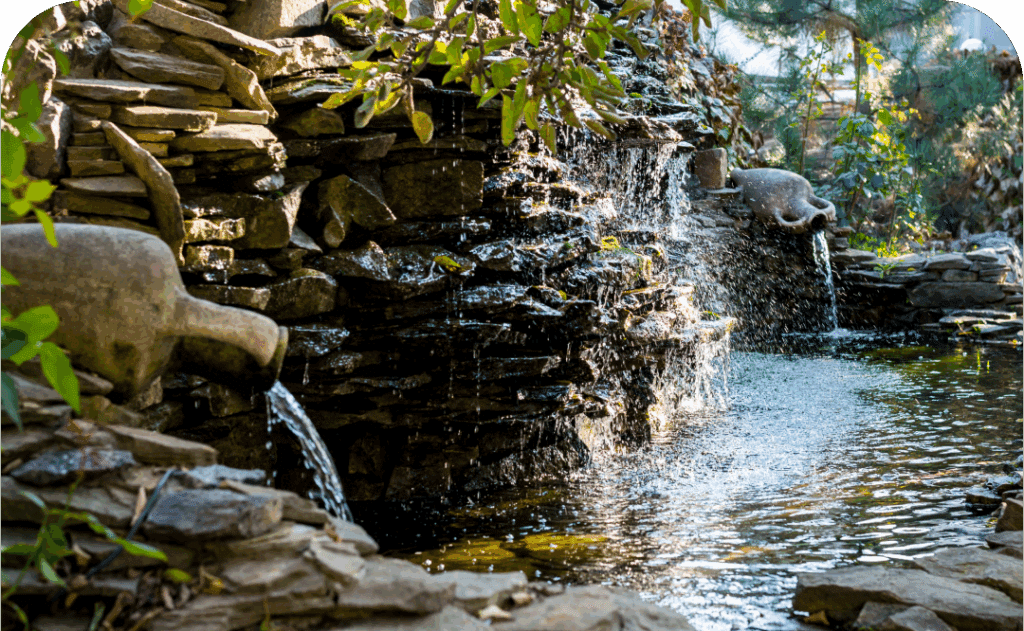 front yard stone retaining wall with plants